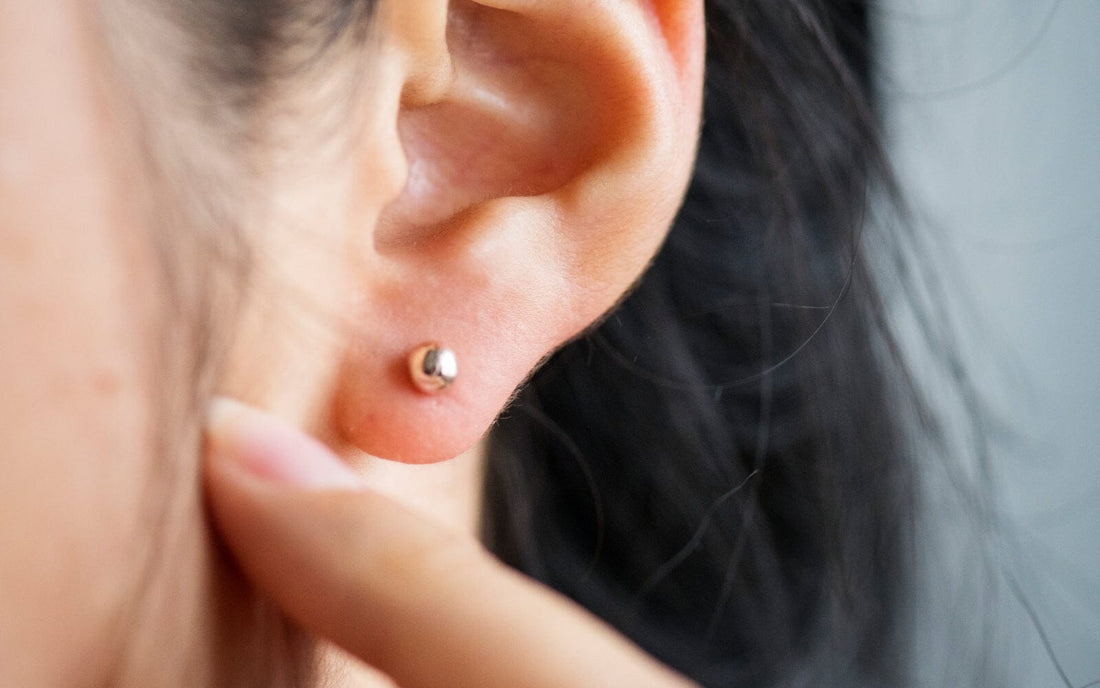 Close-up of an ear with earrings